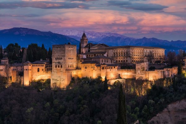 Alhambra Arabic Palace in Granada,Spain Illuminated at Twilight. Sunset Over Alhambra