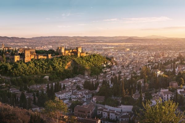 Panoramic view of Granada city with Alhambra at sunset - Granada, Andalusia, Spain